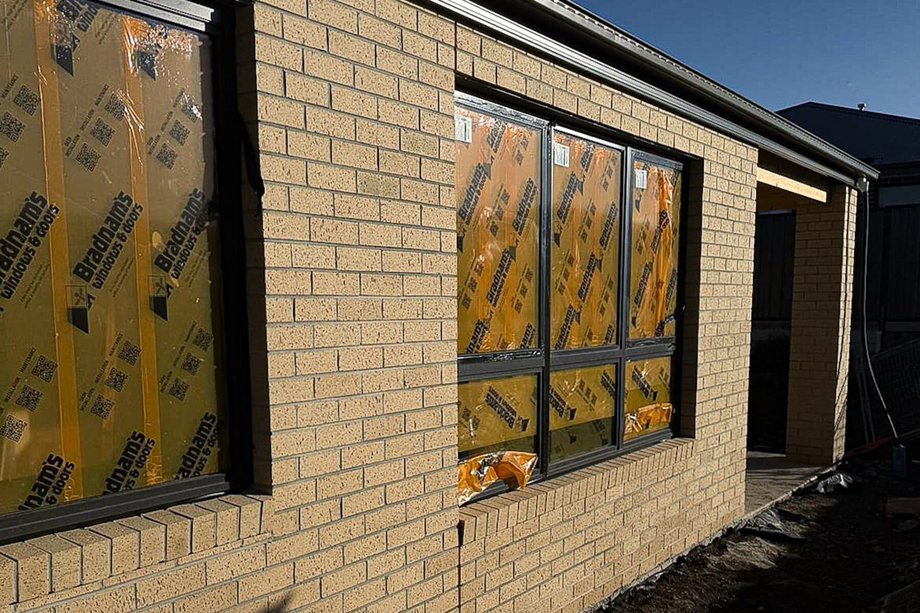 Cream face brick elevation on a home under construction